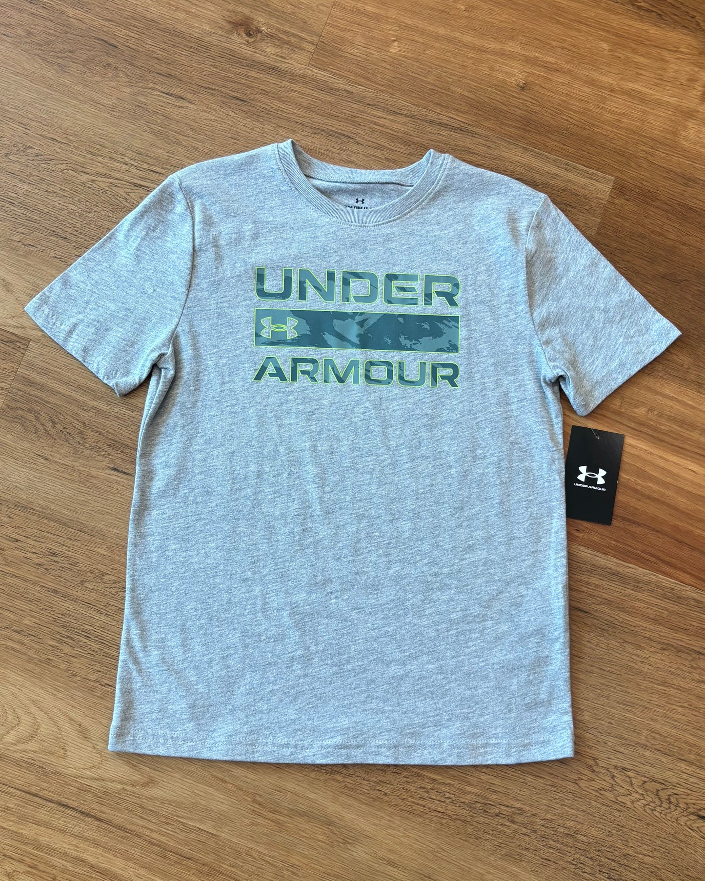 UA Stacked Logo Tee